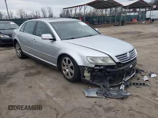 2004 Volkswagen Phaeton V8 z VIN WVWAF63D548007862, wystawiony jako IAAI lot #41721419 z przebiegiem 87 974 mil mil oraz . Historia ofert i sprzedaży dostępna na DreamBid. Obrazek 1.