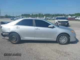 2012 Toyota Camry L z VIN 4T1BF1FK7CU001984, wystawiony jako IAAI lot #41585144 z przebiegiem 20 585 mil mil oraz . Historia ofert i sprzedaży dostępna na DreamBid. Obrazek 13.