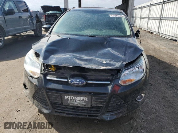 2012 Ford Focus SEL with VIN 1FAHP3H20CL329098, listed as a Copart auction lot 46990485 with 131,783 mi miles and Salvage Title. Bid and sale history available at DreamBid. Image 5.