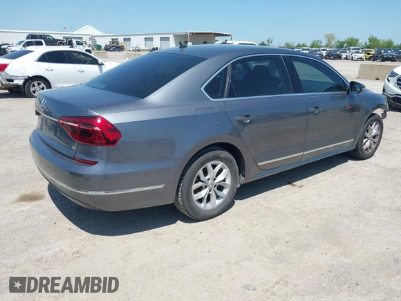 2017 Volkswagen Passat S z VIN 1VWAT7A37HC069014, wystawiony jako IAAI lot #41967310 z przebiegiem 109 266 mil mil oraz . Historia ofert i sprzedaży dostępna na DreamBid. Obrazek 4.