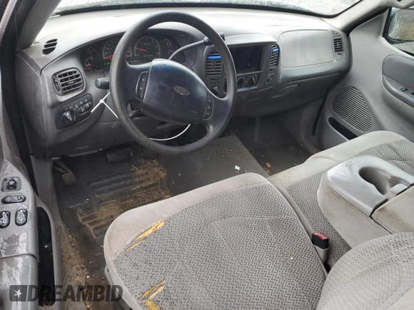 1999 Ford F-150 XL с VIN 1FTRX18L5XNB35835, выставлен на аукционе Copart как лот 52898645 с пробегом 218 637 миль миль и Списание • Salvage title. История ставок и продаж доступна на DreamBid. Изображение 8.