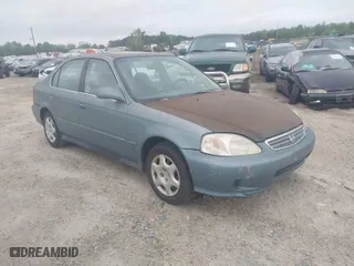 2000 Honda Civic EX with VIN 2HGEJ8648YH601225, listed as a IAAI auction lot 41945291 with 112,853 mi miles. Bid and sale history available at carsss.com. Image 1.