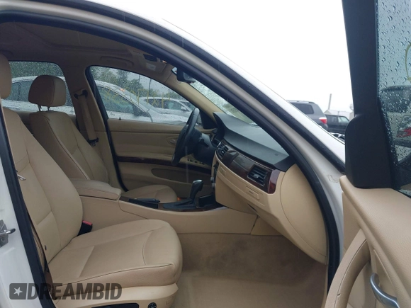 2010 BMW 3 Series 328i with VIN WBAPH7G59ANM52662, listed as a IAAI auction lot 42170338 with 163,648 mi miles and . Bid and sale history available at carsss.com. Image 5.