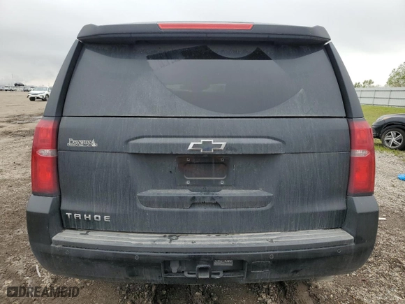 2019 Chevrolet Tahoe LT with VIN 1GNSCBKC6KR254630, listed as a Copart auction lot 50657345 with 111,297 mi miles and Salvage Title. Bid and sale history available at carsss.com. Image 6.
