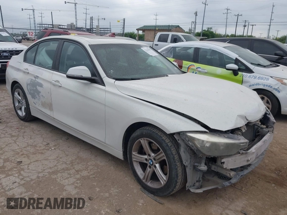 2014 BMW 3 Series 320i xDrive with VIN WBA3C3C52EP661389, listed as a IAAI auction lot 42160042 with 131,997 mi miles and . Bid and sale history available at DreamBid. Image 1.