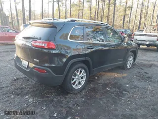 2015 Jeep Cherokee Latitude with VIN 1C4PJMCB3FW648891, listed as a IAAI auction lot 41065231 with 110,193 mi miles. Bid and sale history available at carsss.com. Image 4.