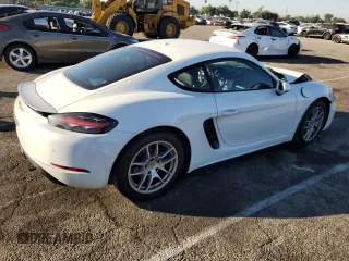 2018 Porsche 718 Cayman z VIN WP0AA2A87JK262265, wystawiony jako Copart lot #72843263 z przebiegiem 32 732 mil mil oraz . Historia ofert i sprzedaży dostępna na DreamBid. Obrazek 3.