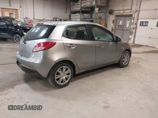 2012 Mazda 2 Sport with VIN JM1DE1KZ0C0149808, listed as a IAAI auction lot 42233078 with 166,111 mi miles and . Bid and sale history available at DreamBid. Image 4.
