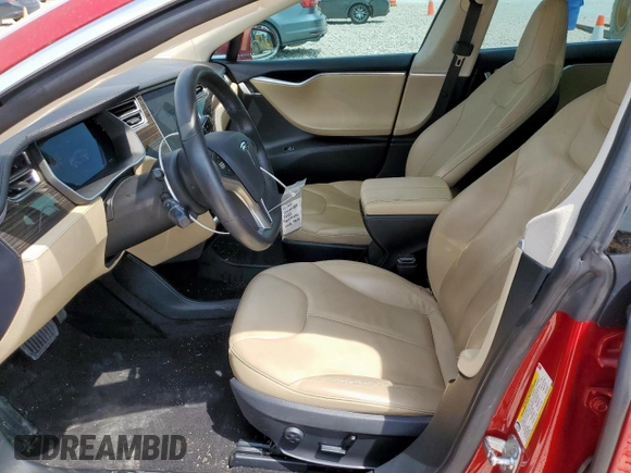 2014 Tesla Model S 60 with VIN 5YJSA1H18EFP38582, listed as a Copart auction lot 56581735 with 69,106 mi miles and Salvage title. Bid and sale history available at DreamBid. Image 7.