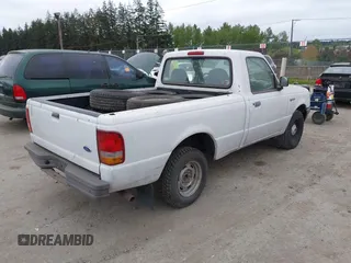 1997 Ford Ranger XLT with VIN 1FTCR10A2VUB88585, listed as a IAAI auction lot 42132083 with 233,961 mi miles. Bid and sale history available at carsss.com. Image 4.