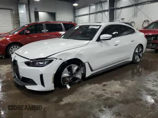 2024 BMW i4 xDrive40 with VIN WBY83FB06RFT27327, listed as a Copart auction lot 84040704 with 5,137 mi miles and Salvage Title. Bid and sale history available at carsss.com. Image 1.
