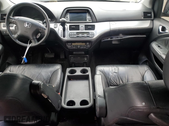 2008 Honda Odyssey Touring z VIN 5FNRL38968B014503, wystawiony jako Copart lot #56817625 z przebiegiem Nie podano mil oraz Szkoda całkowita • Salvage title. Historia ofert i sprzedaży dostępna na DreamBid. Obrazek 8.