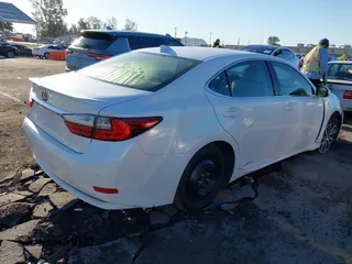 2017 Lexus ES 300h with VIN JTHBW1GG8H2146273, listed as a IAAI auction lot 41825380 with 180,575 mi miles and . Bid and sale history available at DreamBid. Image 4.