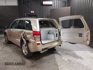 2007 Suzuki Grand Vitara Luxury z VIN JS3TD947474201594, wystawiony jako IAAI lot #42296225 z przebiegiem 120 309 mil mil oraz . Historia ofert i sprzedaży dostępna na DreamBid. Obrazek 3.