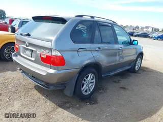 2005 BMW X5 3.0i with VIN 5UXFA13555LY20390, listed as a IAAI auction lot 41903119 with 196,022 mi miles. Bid and sale history available at carsss.com. Image 4.