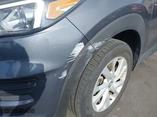2019 Hyundai Tucson SE with VIN KM8J23A42KU079664, listed as a IAAI auction lot 41905729 with 14,624 mi miles. Bid and sale history available at carsss.com. Image 6.