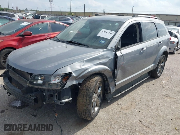 2016 Dodge Journey Crossroad Plus z VIN 3C4PDCGB0GT131602, wystawiony jako IAAI lot #42043545 z przebiegiem 102 225 mil mil oraz . Historia ofert i sprzedaży dostępna na DreamBid. Obrazek 2.