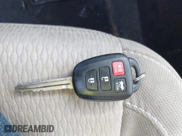 2015 Toyota Corolla L with VIN 5YFBURHE5FP345234, listed as a IAAI auction lot 41764976 with 221,888 mi miles and . Bid and sale history available at DreamBid. Image 11.
