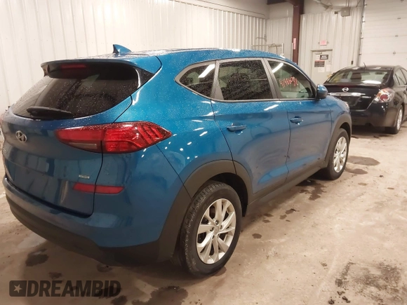 2019 Hyundai Tucson SE with VIN KM8J2CA48KU027746, listed as a IAAI auction lot 41986052 with 93,261 mi miles. Bid and sale history available at carsss.com. Image 4.