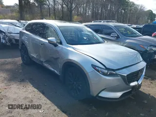 2023 Mazda CX-9 Touring Plus with VIN JM3TCBAY1P0648632, listed as a IAAI auction lot 42019152 with 15,383 mi miles and . Bid and sale history available at DreamBid. Image 1.