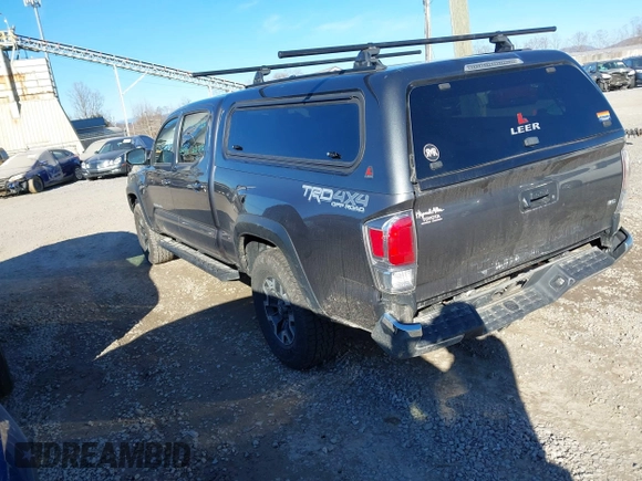 2021 Toyota Tacoma 4WD SR5 with VIN 5TFDZ5BN8MX058531, listed as a IAAI auction lot 41628820 with 102,004 mi miles. Bid and sale history available at carsss.com. Image 3.