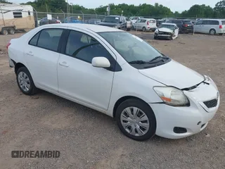 2012 Toyota Yaris z VIN JTDBT4K3XC1415243, wystawiony jako IAAI lot #42251811 z przebiegiem 198 838 mil mil oraz . Historia ofert i sprzedaży dostępna na DreamBid. Obrazek 1.