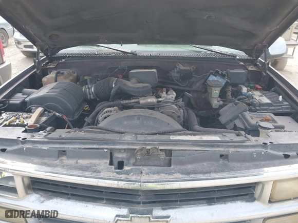 1997 Chevrolet Tahoe with VIN 1GNEK13R8VJ329165, listed as a IAAI auction lot 41631672 with 166,976 mi miles. Bid and sale history available at carsss.com. Image 10.