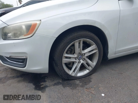 2014 Volvo S60 T5 с VIN YV1612FS0E1286021, выставлен на аукционе IAAI как лот 41708156 с пробегом 115 376 миль миль и . История ставок и продаж доступна на DreamBid. Изображение 6.