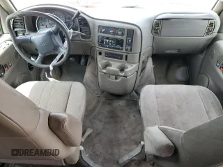 1999 Chevrolet Astro z VIN 1GNDM19WXXB114838, wystawiony jako Copart lot #55070715 z przebiegiem Nie podano mil oraz Szkody całkowita. Historia ofert i sprzedaży dostępna na DreamBid. Obrazek 8.