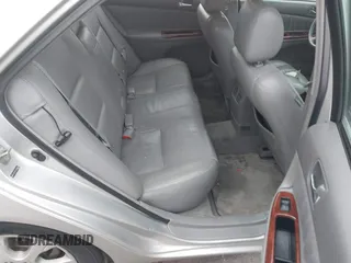 2005 Toyota Camry LE with VIN 4T1BF30K15U609930, listed as a IAAI auction lot 41321401 with 287,792 mi miles and . Bid and sale history available at DreamBid. Image 8.