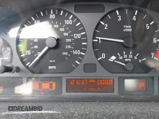 2005 BMW 3 Series 325i with VIN WBAET37445NJ85538, listed as a IAAI auction lot 41872686 with 121,237 mi miles. Bid and sale history available at carsss.com. Image 7.