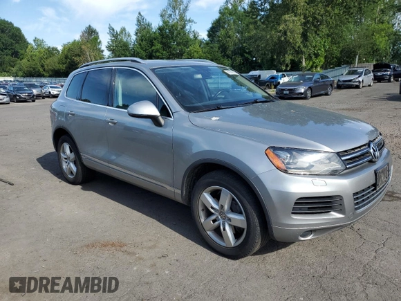 2012 Volkswagen Touareg с VIN WVGEG9BP6CD008533, выставлен на аукционе Copart как лот 60356345 с пробегом 103 270 миль миль и Чистый • Clean title. История ставок и продаж доступна на DreamBid. Изображение 4.