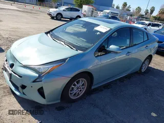 2018 Toyota Prius Two with VIN JTDKARFU9J3065238, listed as a IAAI auction lot 41676208 with 267,357 mi miles. Bid and sale history available at carsss.com. Image 2.