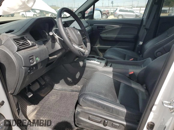 2023 Honda Passport EX-L z VIN 5FNYF8H56PB023651, wystawiony jako Copart lot #51015165 z przebiegiem 24 144 mil mil oraz Szkoda całkowita • Salvage title. Historia ofert i sprzedaży dostępna na DreamBid. Obrazek 7.