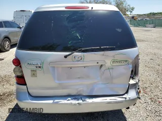 2005 Mazda MPV LX with VIN JM3LW28AX50550048, listed as a Copart auction lot 52915715 with 111,282 mi miles and Salvage title. Bid and sale history available at DreamBid. Image 6.