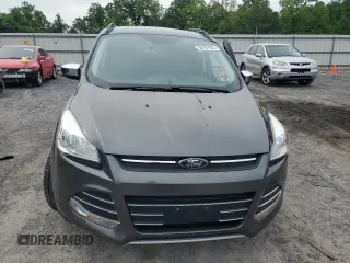 2016 Ford Escape SE z VIN 1FMCU9G95GUC33848, wystawiony jako Copart lot #58191925 z przebiegiem 108 194 mil mil oraz Szkoda całkowita • Salvage title. Historia ofert i sprzedaży dostępna na DreamBid. Obrazek 5.