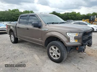 2015 Ford F-150 XLT с VIN 1FTEW1EG4FKE48657, выставлен на аукционе Copart как лот 60234295 с пробегом 191 314 миль миль и Списание • Salvage title. История ставок и продаж доступна на DreamBid. Изображение 4.