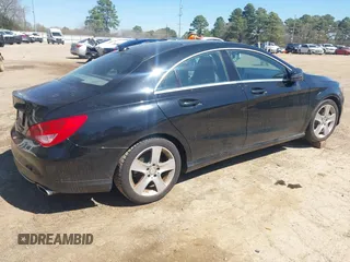 2016 Mercedes-Benz CLA with VIN WDDSJ4EB1GN299038, listed as a IAAI auction lot 41805142 with 95,621 mi miles. Bid and sale history available at carsss.com. Image 4.