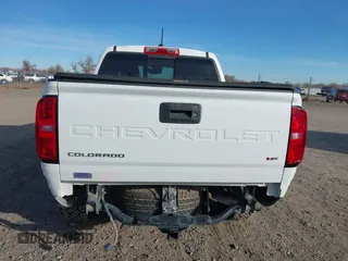 2021 Chevrolet Colorado 4WD Z71 z VIN 1GCGTDEN3M1234781, wystawiony jako IAAI lot #41086044 z przebiegiem 45 010 mil mil oraz . Historia ofert i sprzedaży dostępna na DreamBid. Obrazek 6.