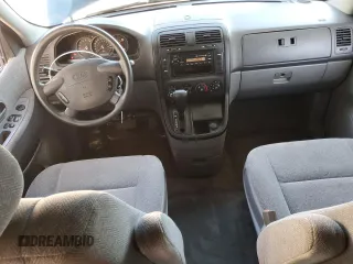 2003 Kia Sedona LX with VIN KNDUP131736448714, listed as a Copart auction lot 82308764 with 91,073 mi miles and Salvage Title. Bid and sale history available at carsss.com. Image 8.