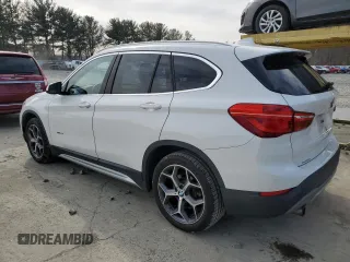 2016 BMW X1 xDrive28i with VIN WBXHT3C31GP884424, listed as a Copart auction lot 45737555 with 132,959 mi miles and Clean Title. Bid and sale history available at carsss.com. Image 2.