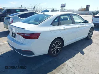 2023 Volkswagen Jetta Sport with VIN 3VWBM7BU5PM051794, listed as a IAAI auction lot 42023152 with 31,826 mi miles and . Bid and sale history available at DreamBid. Image 4.