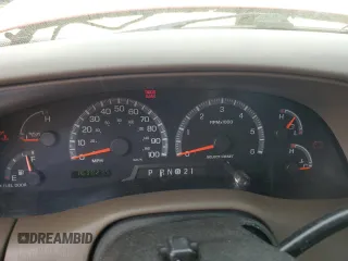 1999 Ford F-150 with VIN 1FTZX1725XNA33332, listed as a Copart auction lot 51867455 with 163,023 mi miles and Salvage title. Bid and sale history available at DreamBid. Image 9.
