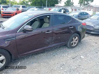 2015 Kia Optima LX with VIN 5XXGM4A70FG478819, listed as a IAAI auction lot 42571214 with 130,707 mi miles and . Bid and sale history available at DreamBid. Image 6.