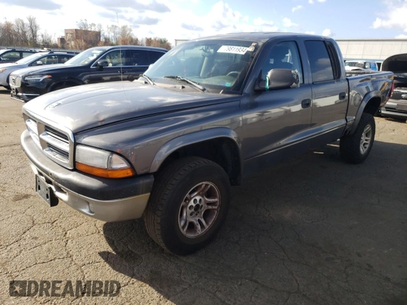 2004 Dodge Dakota Sport z VIN 1D7HG38N64S688604, wystawiony jako Copart lot #79811934 z przebiegiem 160 377 mil mil oraz Szkoda całkowita • Salvage title. Historia ofert i sprzedaży dostępna na DreamBid. Obrazek 1.