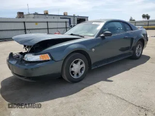 1999 Ford Mustang z VIN 1FAFP4041XF140264, wystawiony jako Copart lot #54801555 z przebiegiem 156 514 mil mil oraz Szkoda całkowita • Salvage title. Historia ofert i sprzedaży dostępna na DreamBid. Obrazek 1.