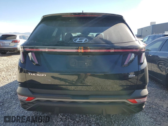 2022 Hyundai Tucson SEL with VIN 5NMJBCAE5NH030189, listed as a Copart auction lot 75327374 with 33,864 mi miles and Salvage Title. Bid and sale history available at DreamBid. Image 6.