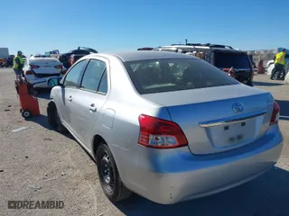 2012 Toyota Yaris with VIN JTDBT4K35CL038860, listed as a IAAI auction lot 41254384 with 161,536 mi miles. Bid and sale history available at carsss.com. Image 3.