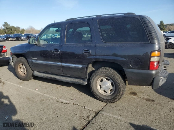 2005 GMC Yukon SLT with VIN 1GKEC13V95J163892, listed as a Copart auction lot 50243795 with 211,048 mi miles and Salvage Title. Bid and sale history available at carsss.com. Image 2.