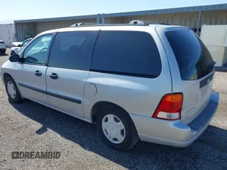 2003 Ford Windstar LX with VIN 2FMZA51463BB80988, listed as a IAAI auction lot 42191972 with 205,338 mi miles and . Bid and sale history available at carsss.com. Image 3.